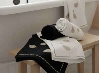 מגבת דגם בראון קרם ריקמה זהב